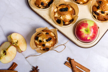 Homemade muffin with apples and raisins