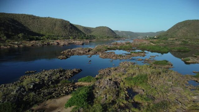 Drone footage over the stretch of Sao Francisco River after the dam of the Xingo in Piranhas, Brazil