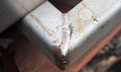Rusty metal background, close up of rust on metal plate.