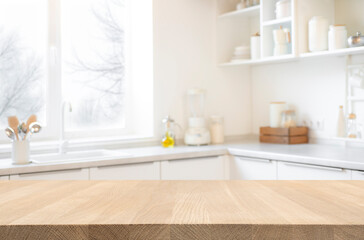Blurred modern kitchen interior background with wooden table space for product montage - obrazy, fototapety, plakaty
