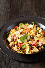 mexican rotisserie chicken salad in black bowl