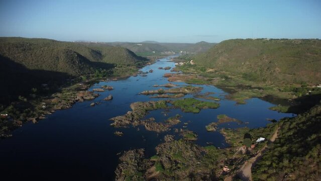 Drone shot of the stretch of the Sao Francisco River after the Xingo dam in Piranhas, Brazil