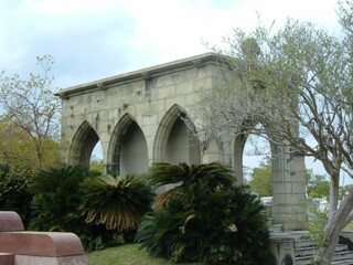 Fototapeta na wymiar Mausoleum with sega palm