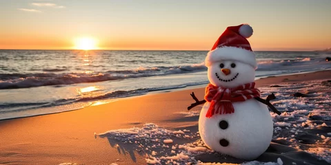 Kussenhoes Snowman on the beach at sunset in winter. Christmas and New Year concept. © Meow Creations