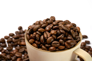 Black coffee and coffee beans on white background