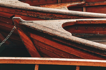 Fototapeta na wymiar Wooden dinghy boats on Lake Bohinj in Slovenia