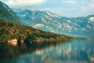 Beautiful Slovenian glacial lake Bohinj in front of mountain during the summer