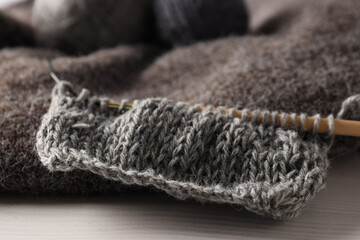 Concept of hobby, cozy winter and autumn hobby - knitting