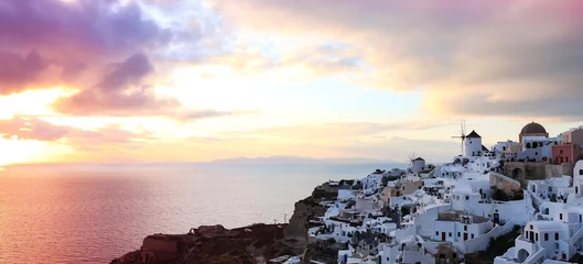 Foto auf Acrylglas The famous of landscape view point as Sunset sky scene at Oia town on Santorini island, Greece © SASITHORN