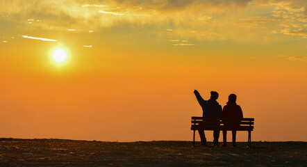 Fototapeta premium Two Close Friends Watching the Sunrise