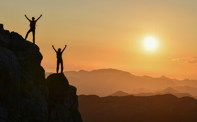 The Joy of Two Friends at the Summit