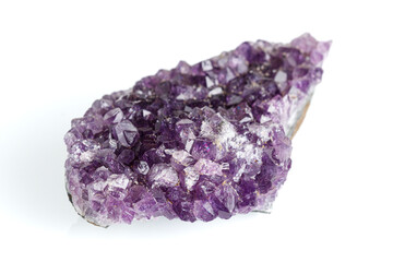 Fototapeta premium Amethyst mineral stone macro on white background