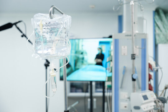 A bag with saline solution for an IV in the operating room. Selective focus. The inscription in Russian means sodium chloride solution for infusion. Moscow. Russia. September 16, 2023.