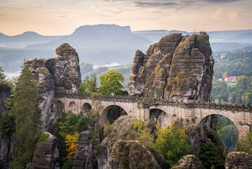 The Bastei Bridge at Saxon Switzerland National Park, or Nationalpark Sächsische Schweiz - obrazy, fototapety, plakaty