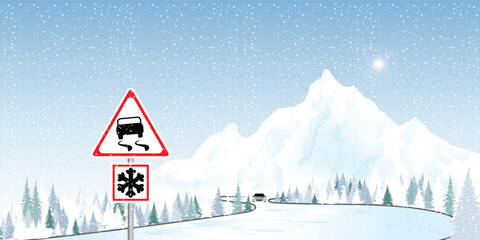 Road sign warns of ice and snow at winter.