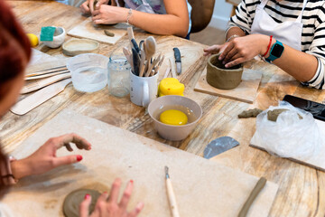 Ceramic Workshop. Women working clay for their ceramic creations.