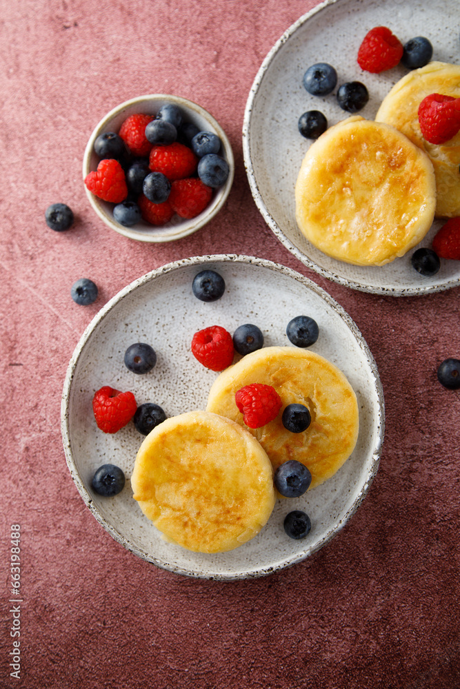 Wall mural cottage cheese cakes with fresh berries