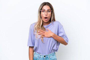 Young Uruguayan woman isolated on white background surprised and shocked while looking right