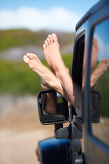 Car window, feet and person on outdoor journey, easy adventure or motor transport on travel...