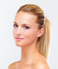Obraz premium Happy woman, portrait and face with hair style in skincare beauty or makeup cosmetics against a studio background. Closeup of female person, blonde or model smile for spa salon or facial treatment