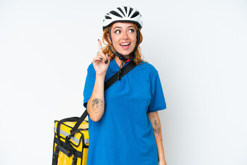Young caucasian woman with thermal backpack isolated on white background intending to realizes the solution while lifting a finger up