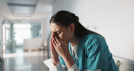 Stress, sad and loss with a woman nurse in hospital after a fail, mistake or error in healthcare...