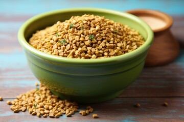 fenugreek seeds in a ceramic bowl