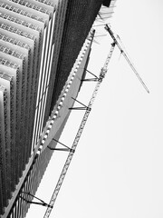Black and white image of an unfinished skyscraper