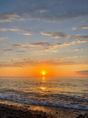 Sunset with beach, sea, sunset sky and cloud. Evening landscape
