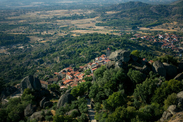 Fototapeta na wymiar A view of a medieval village among boulders in Monsanto, Portugal.