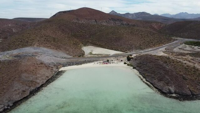 Aerial view of Playa El Tecolote near La paz Baja California Sur Mexico with a view to the beautiful beach and majestic mountains in the background while vacation