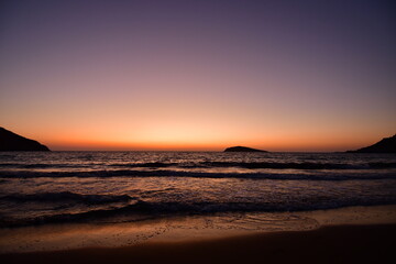 sunset long exposure waves sand greece europe