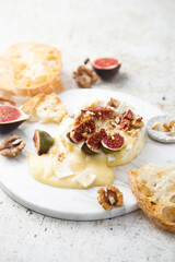 Baked camembert cheese with figs and honey