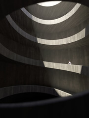 Obraz premium a man climbs a spiral path