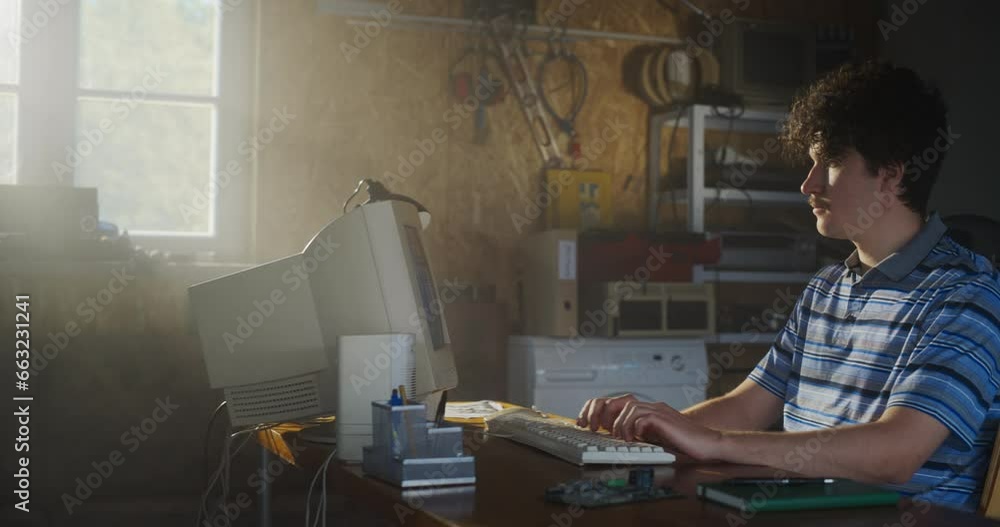 Poster Caucasian Male Software Engineer Programming On Old Desktop Computer In Retro Garage. Enthusiast Browsing Early Internet Forums, Coding Applications, Chatting Online In Nineties. Nostalgia Concept.
