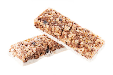 Oat and nut bar isolated on white. Granola bar. Healthy sweet dessert snack. Cereal granola bar with nuts, fruit and berries. Healthy munchies. 