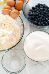 Lemon blueberry bundt cake with powdered sugar dusting