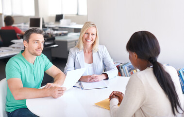 Obraz premium Business people, job interview and documents for startup career and manager in meeting at tech company. Professional clients or employer with paper, resume or CV for information technology onboarding