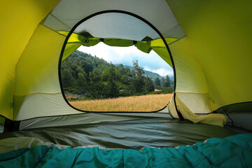 The personal perspective of a person who sets up a tent at the top of the mountain, where he will be in touch with nature, and looks around. © thehakanarslan