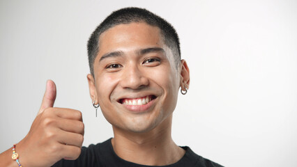 Handsome person look at camera close up. Young adult man face portrait. Stylish 30 years old guy on isolated white background. Attractive male model. Modern millennial people. Brutal style barber shop