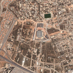 Aerial drone, state map and satellite view of landscape, nature and city outdoor. Land, urban or Iraq above with houses, neighborhood and roads with commercial development from top with infastructure