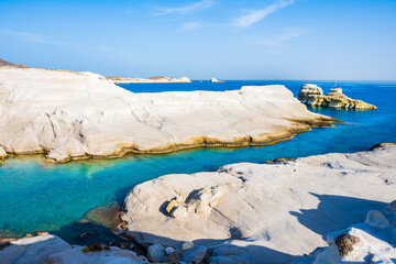 Rocky beach of Sarakiniko with crystal clear sea water bay, Milos island, Cyclades, Greece