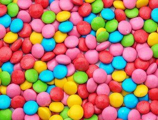 Fototapeta na wymiar sweet and bright colorful candies background
