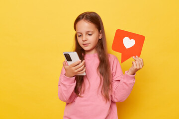 Social media content. Like feedback. User app. Brown haired little girl wearing pink sweatshirt...
