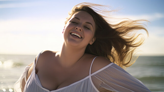 A plus-size model enjoys the sunshine on the beach by the sea