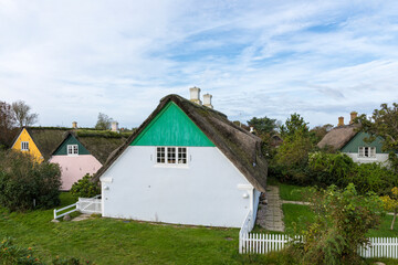 Fototapeta na wymiar Traditional thateched roof cottages at Sønderho, Fanø island, Denmark