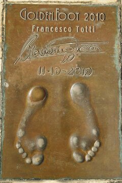 footprints on the Promenade of Champions of the Monte Carlo seafront in the Principality of Monaco of the Italian footballer Francesco Totti winner of the Golden Foot award