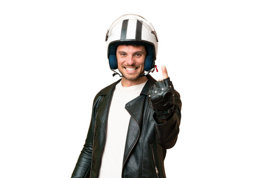 Brazilian man with a motorcycle helmet over isolated chroma key background doing coming gesture