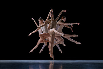 Elegance and grace. Young, talented, artistic people, ballet dancers in motion, training, dancing against black background. Concept of classical and modern dance, beauty, creativity, art, theater