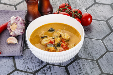 Traditional yellow Thai curry with chicken